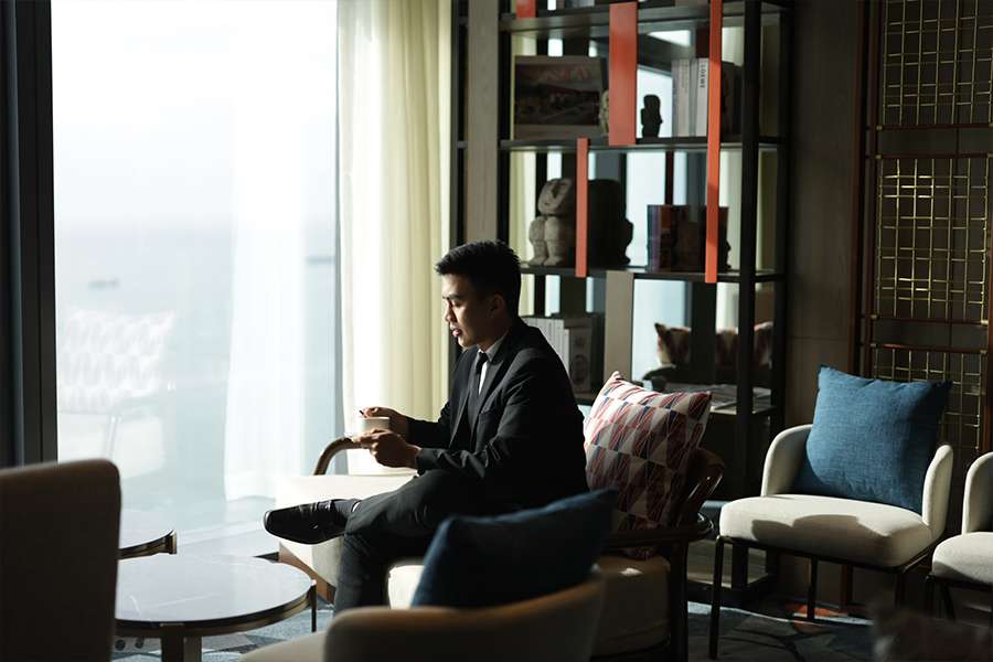 The Executive Club (Key Image) Man Sitting